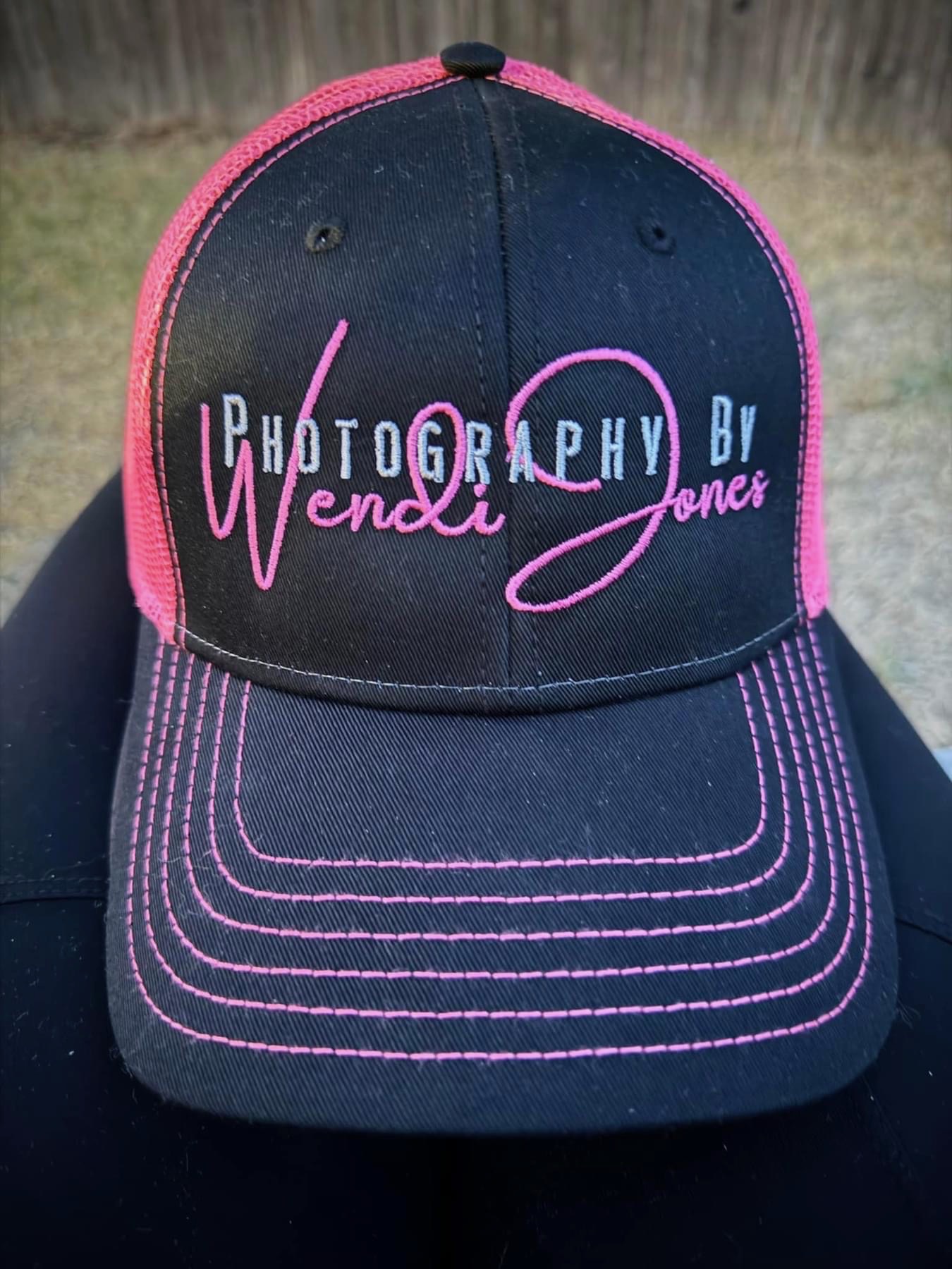 Navy and pink trucker cap with Photography By Wendi Jones embroidery