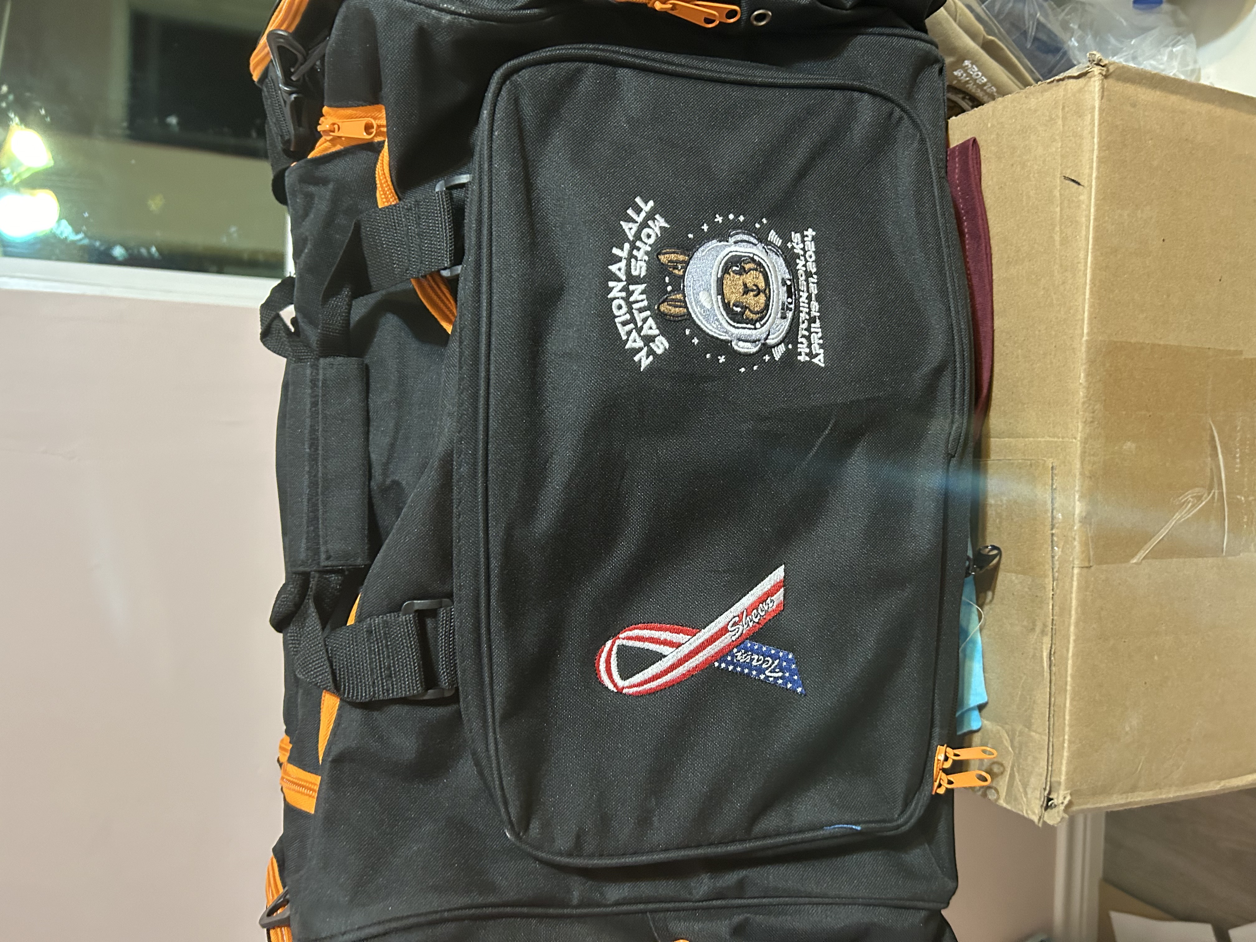 Black duffel bag with National All Satin Show embroidery